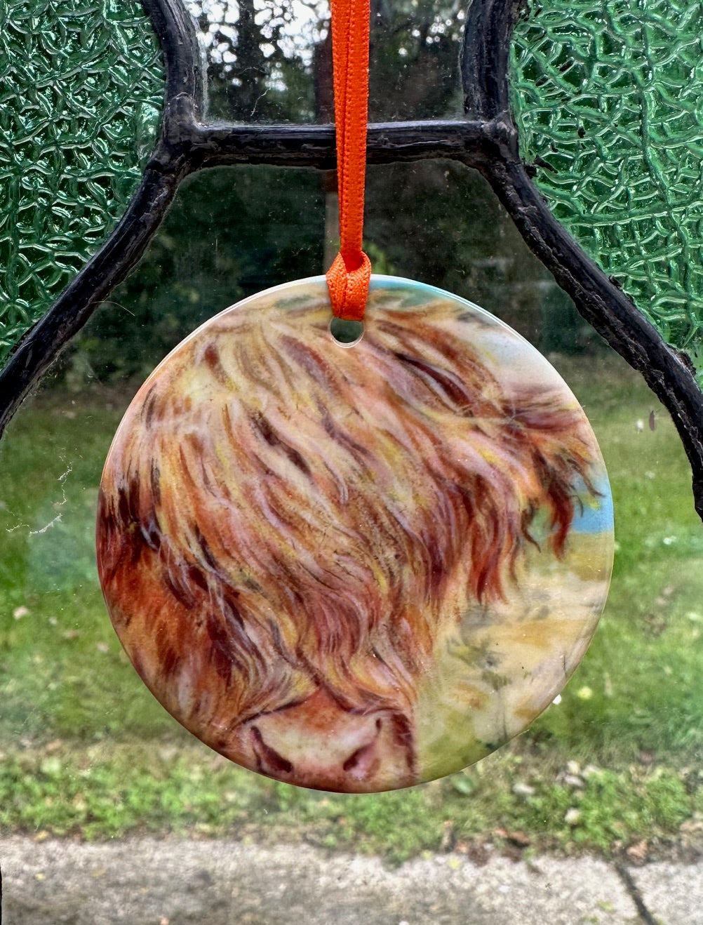 Small round hanging ornament/Hamish the highland coo