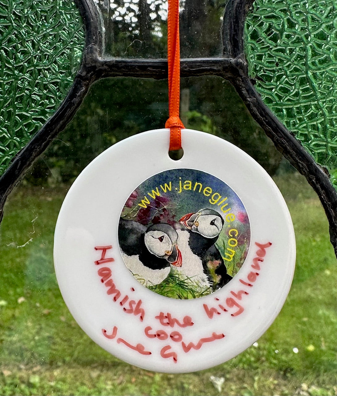 Small round hanging ornament/Hamish the highland coo