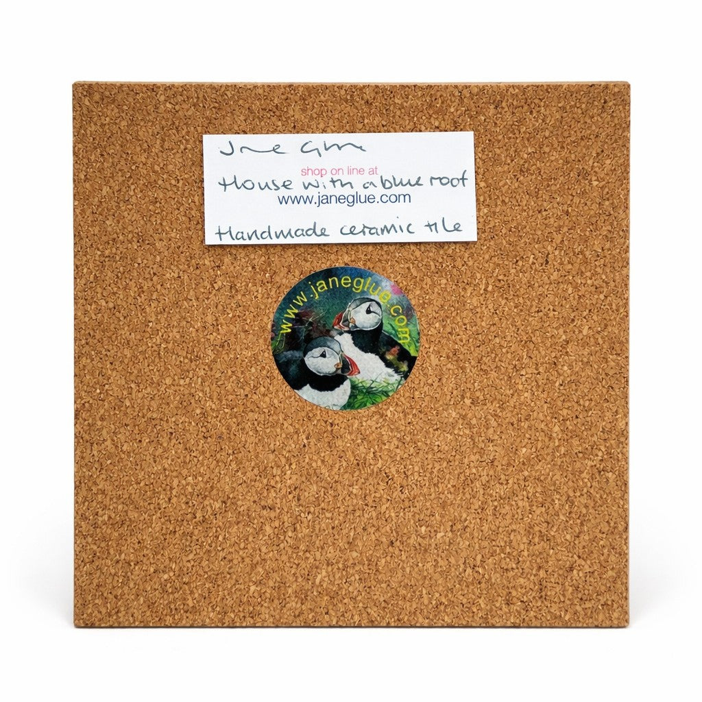 Medium ceramic tile/House with a blue roof