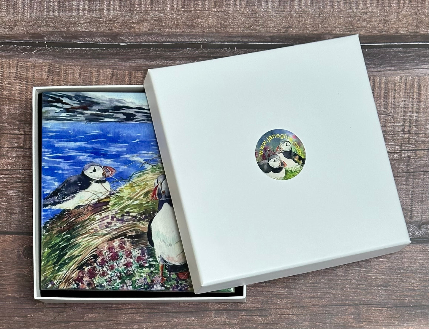 Medium ceramic tile/Curious puffins