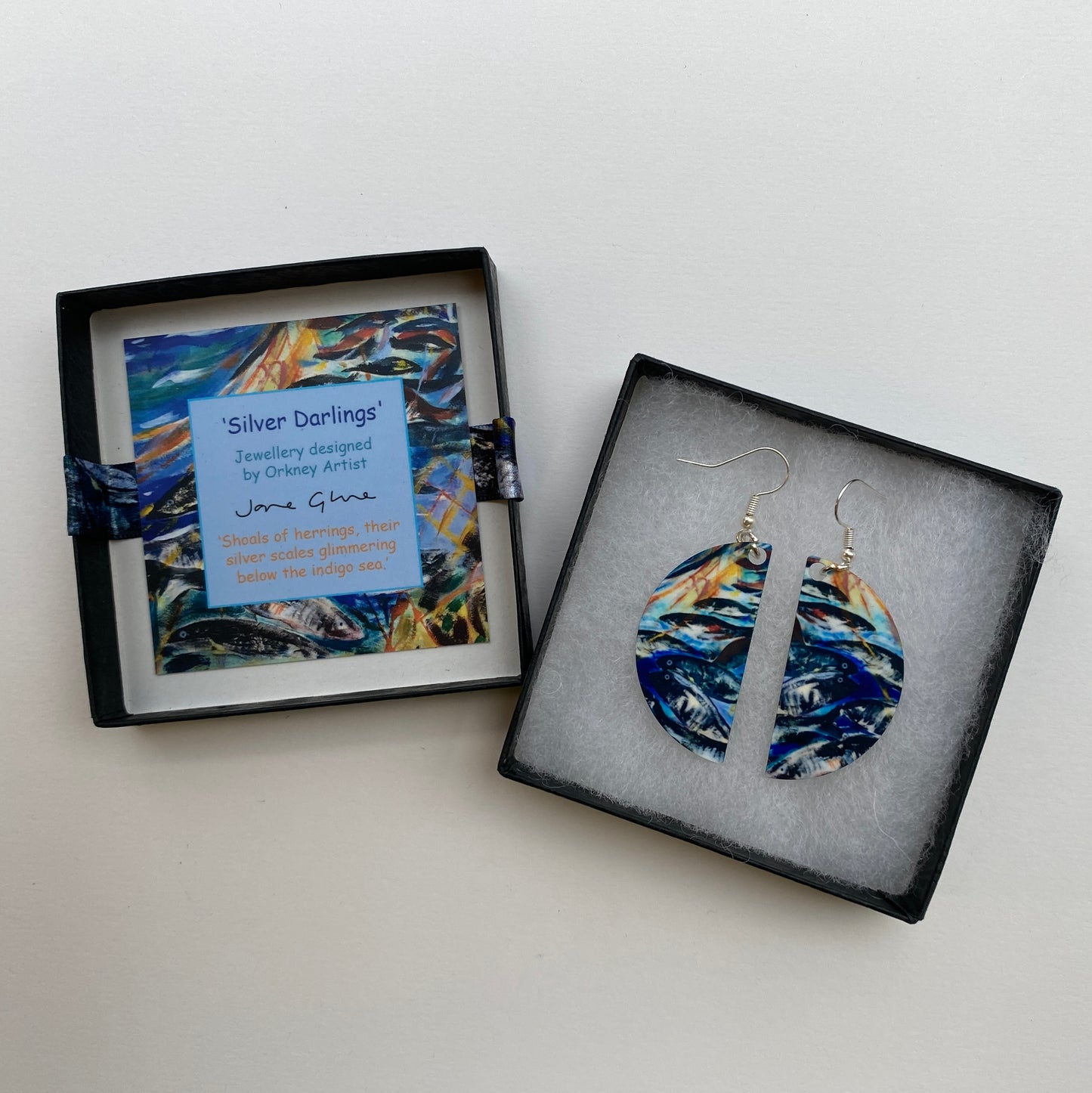 A pair of earrings design Silver darlings by Orkney artist Jane Glue, Scotland