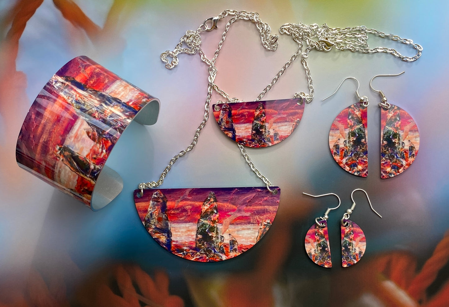 A collection of jewellery design , Wild sunset at THe Ring of Brodgar by Orkney artist Jane Glue, Scotland