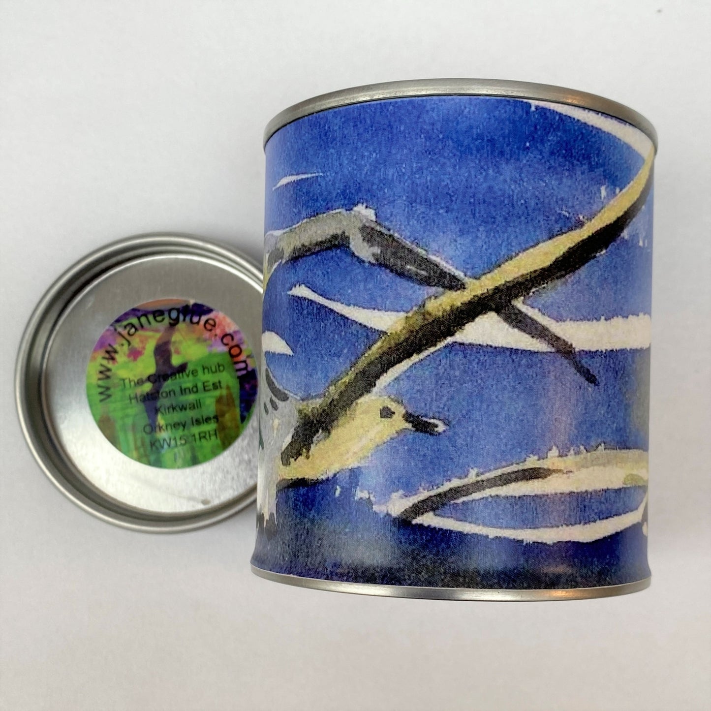 handmade candle tin with a watercolour picture of gulls