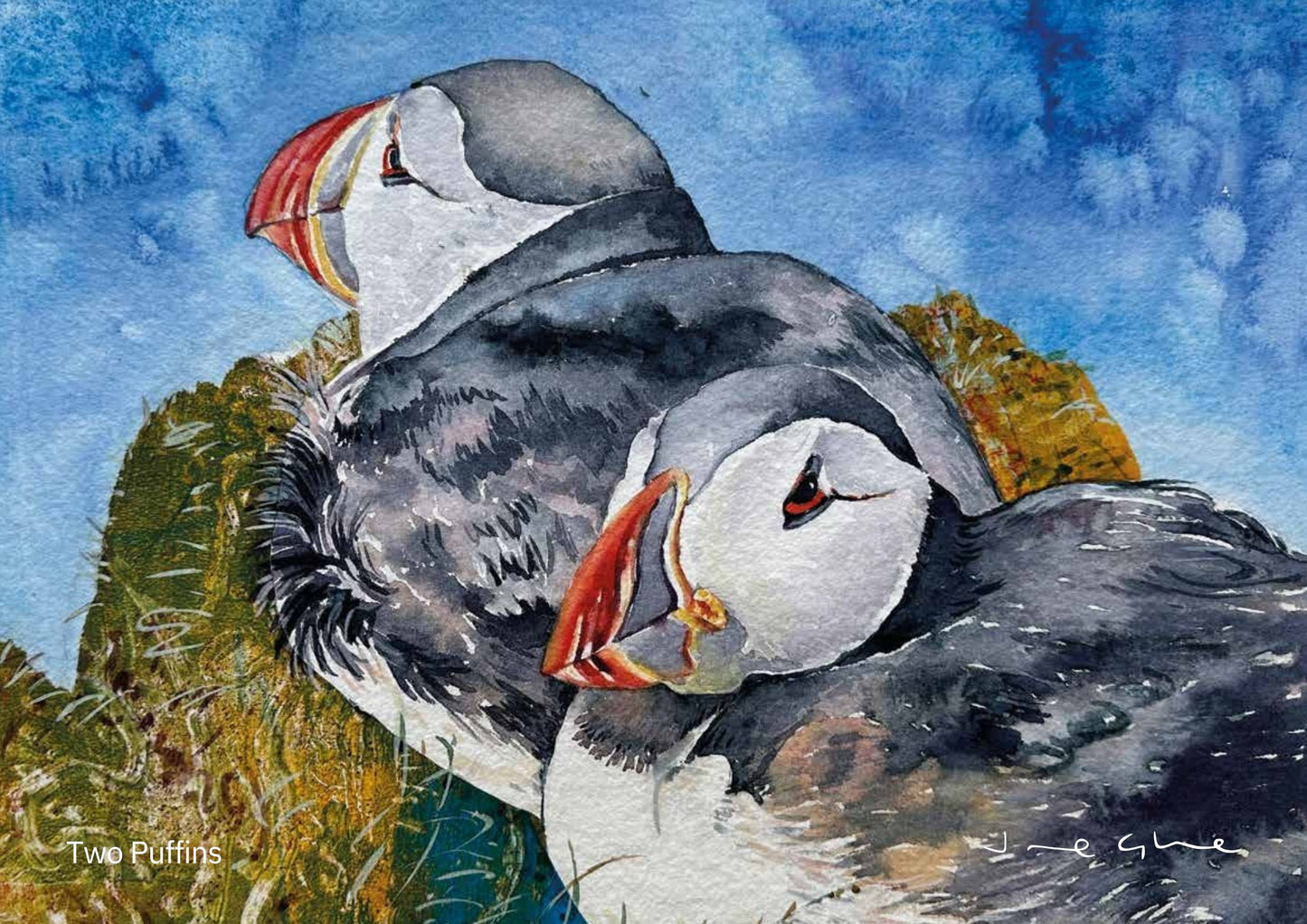 Orkney calendar 2025 April mixed media painting of two puffins sitting on a grassy cliff with a deep blue sky behind by Orkney artist Jane Glue Scotland