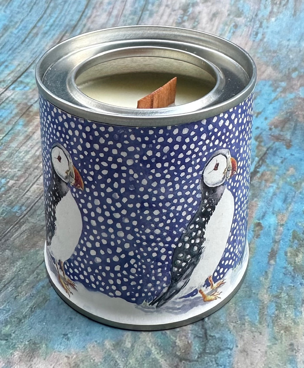 Small candle in a tin/Puffin in the snow