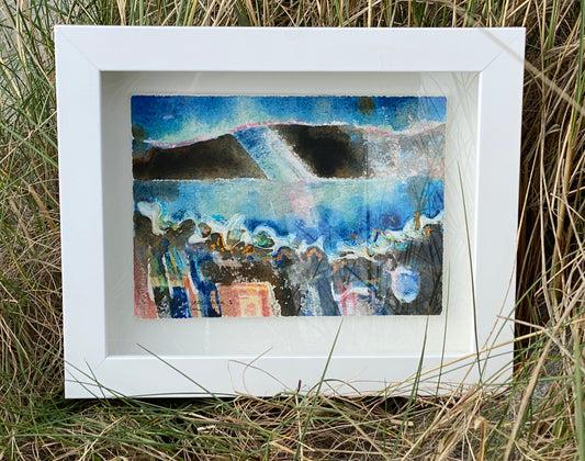 A framed abstract landscape picture by artist Jane Glue from Orkney, Scotland using mixed media such as watercolours, gesso, collage and crayons.