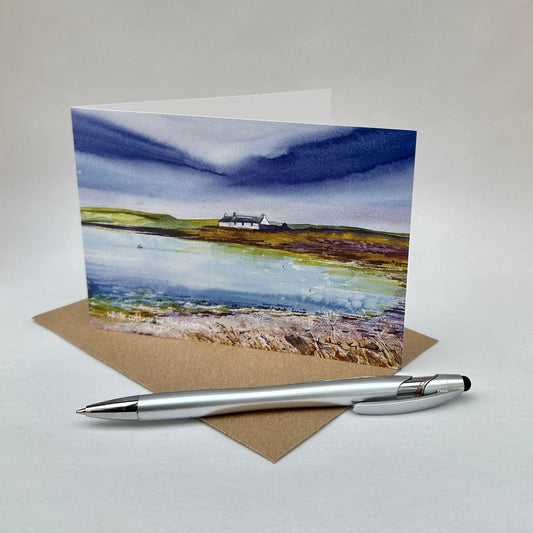 Card-White cottage by the shore