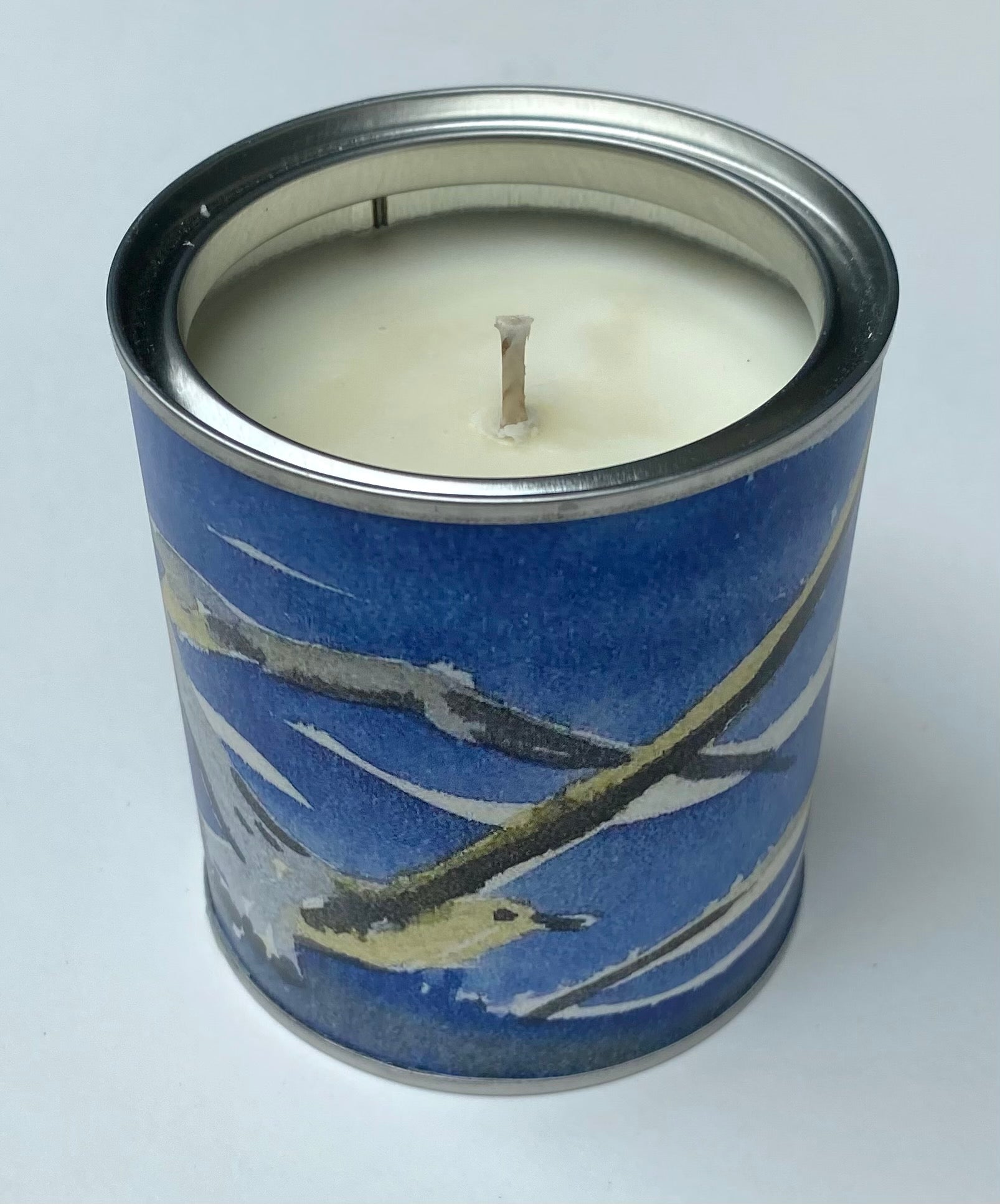 handmade candle tin with a watercolour picture of gulls