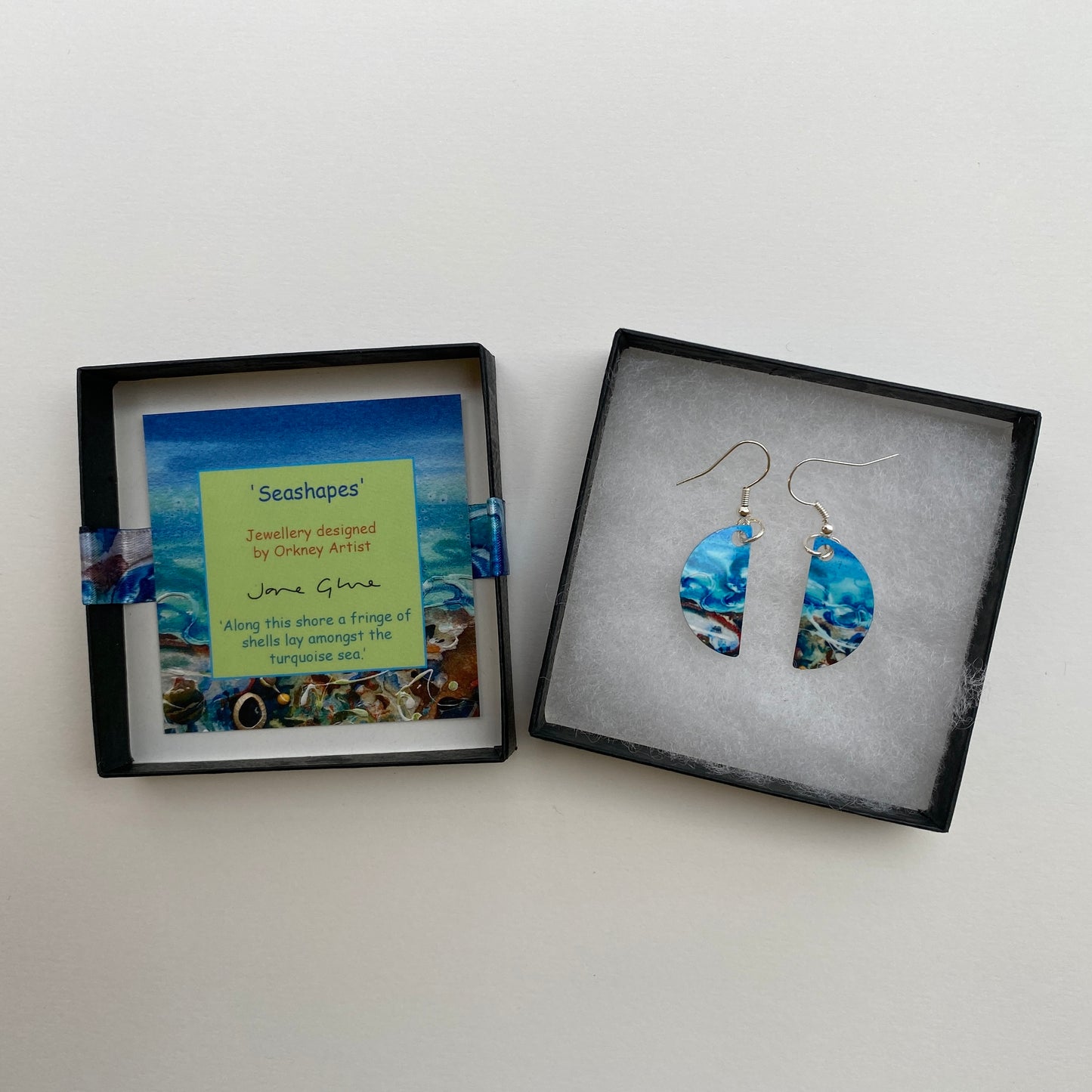 A pair of earrings Shorelines design by Orkney artist Jane Glue, Scotland