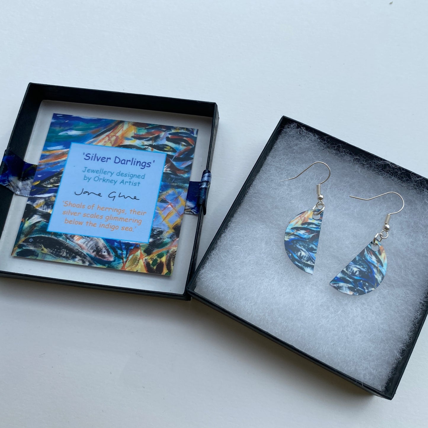 A pair of earrings, Silver Darlings designed by Orkney artist Jane Glue, Scotland
