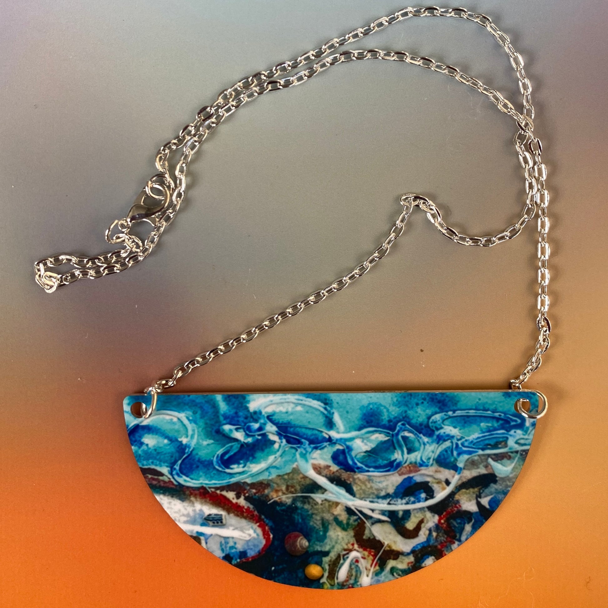 Shorelines design of necklace designed by Orkney artist Jane Glue Scotland