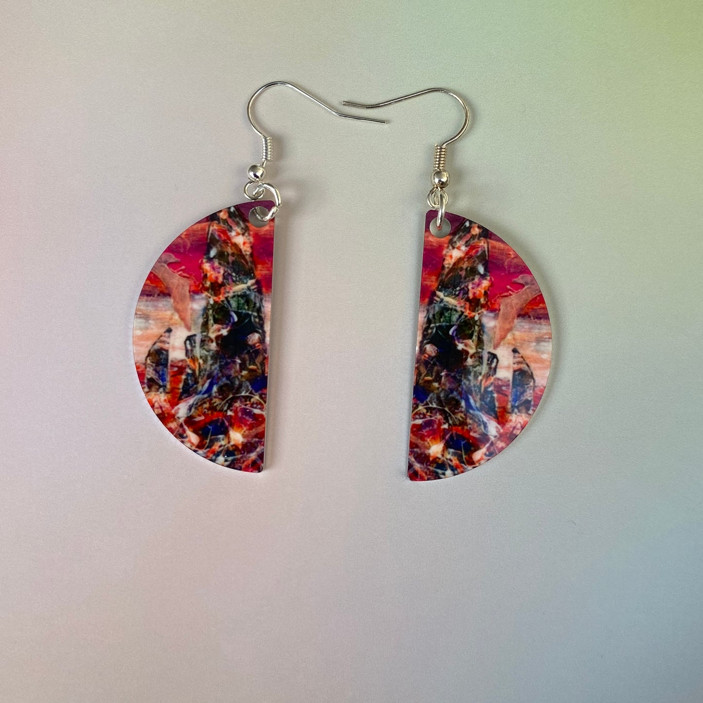 A pair of earrings design Wild sunset at The Ring of Brodgar by Orkney artist Jane Glue, Scotland