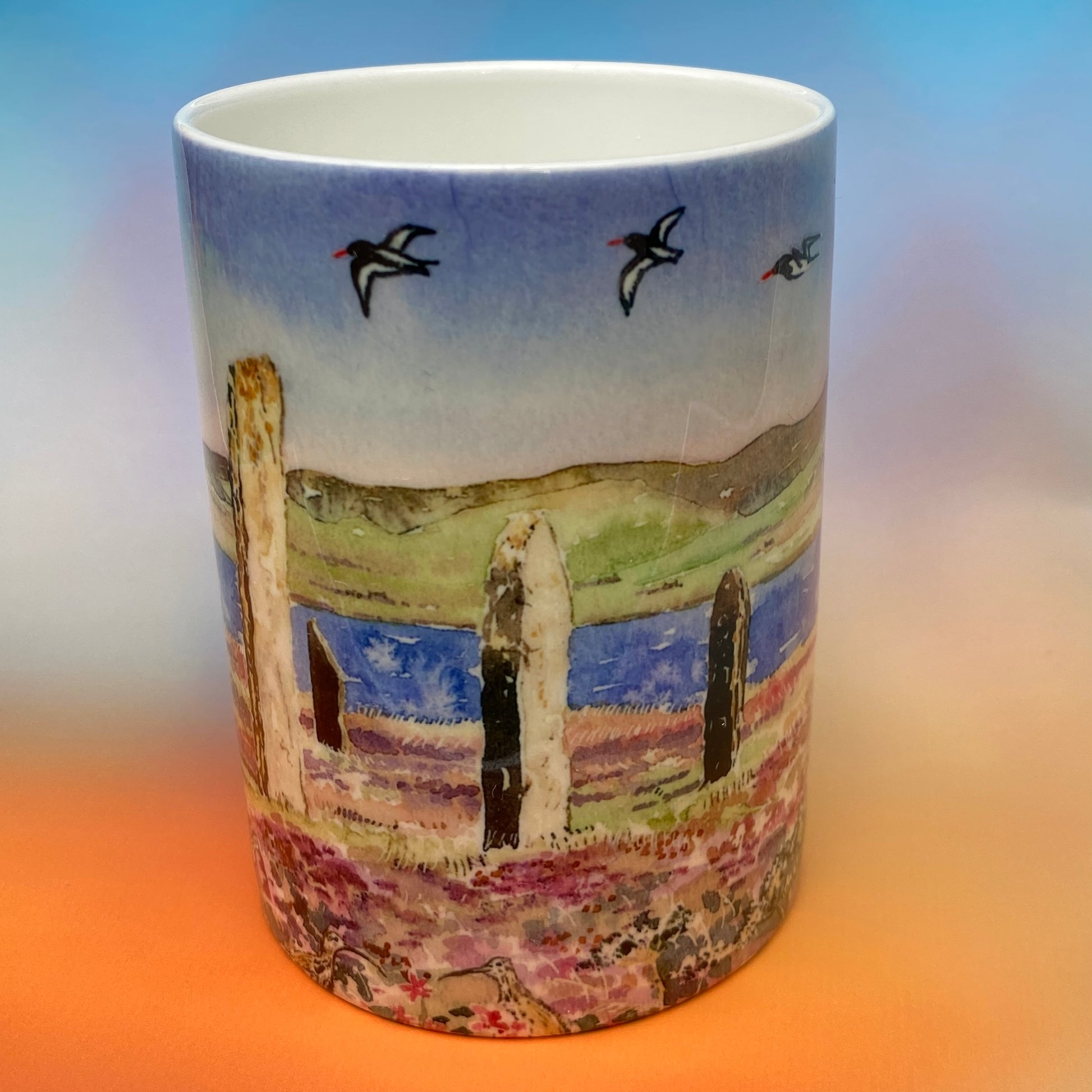 A mug with The ring of brodgar design by Orkney artist Jane Glue, Scotland